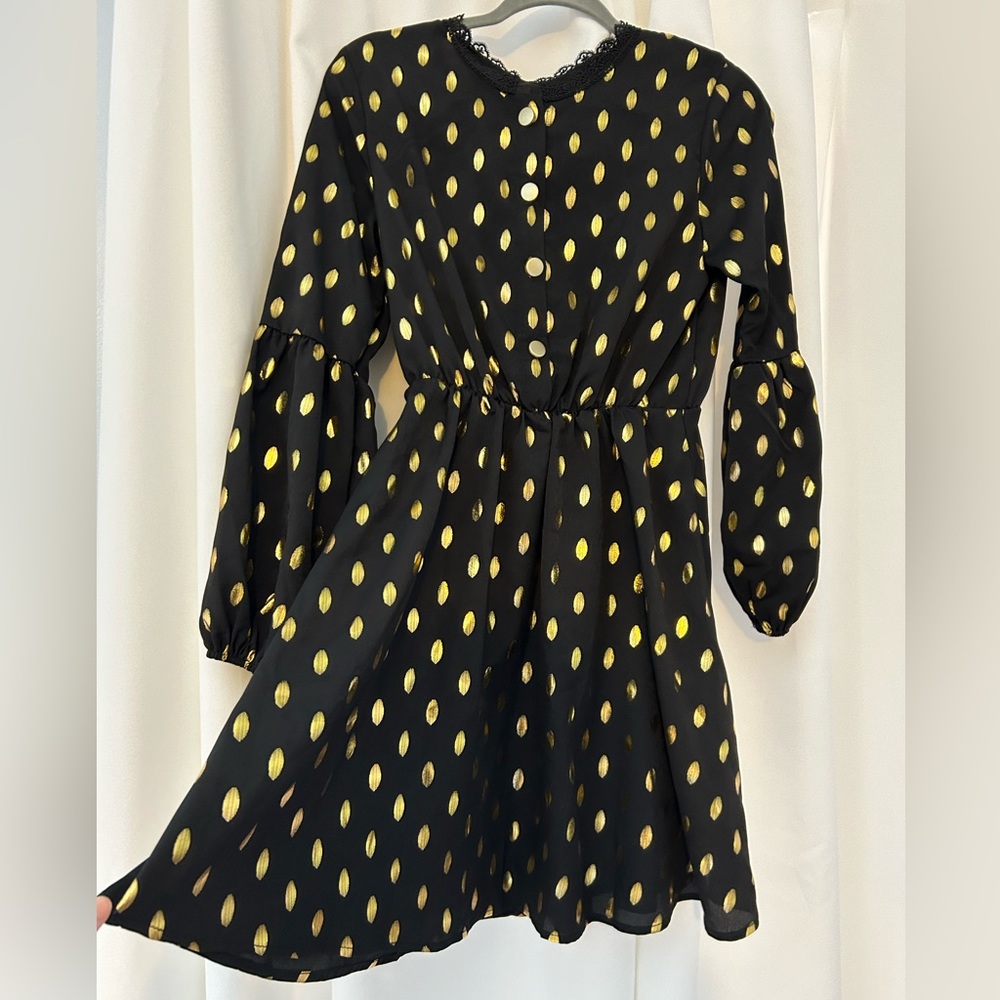 Adorable black and gold dress.  Worn once!